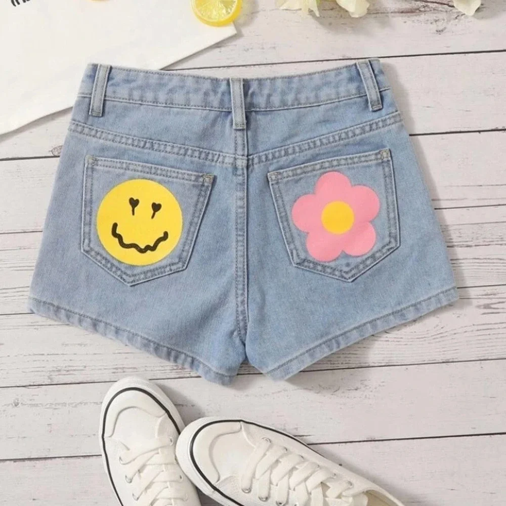 Shein Girls Floral and Cartoon Face Print Denim Shorts - 11-12Y